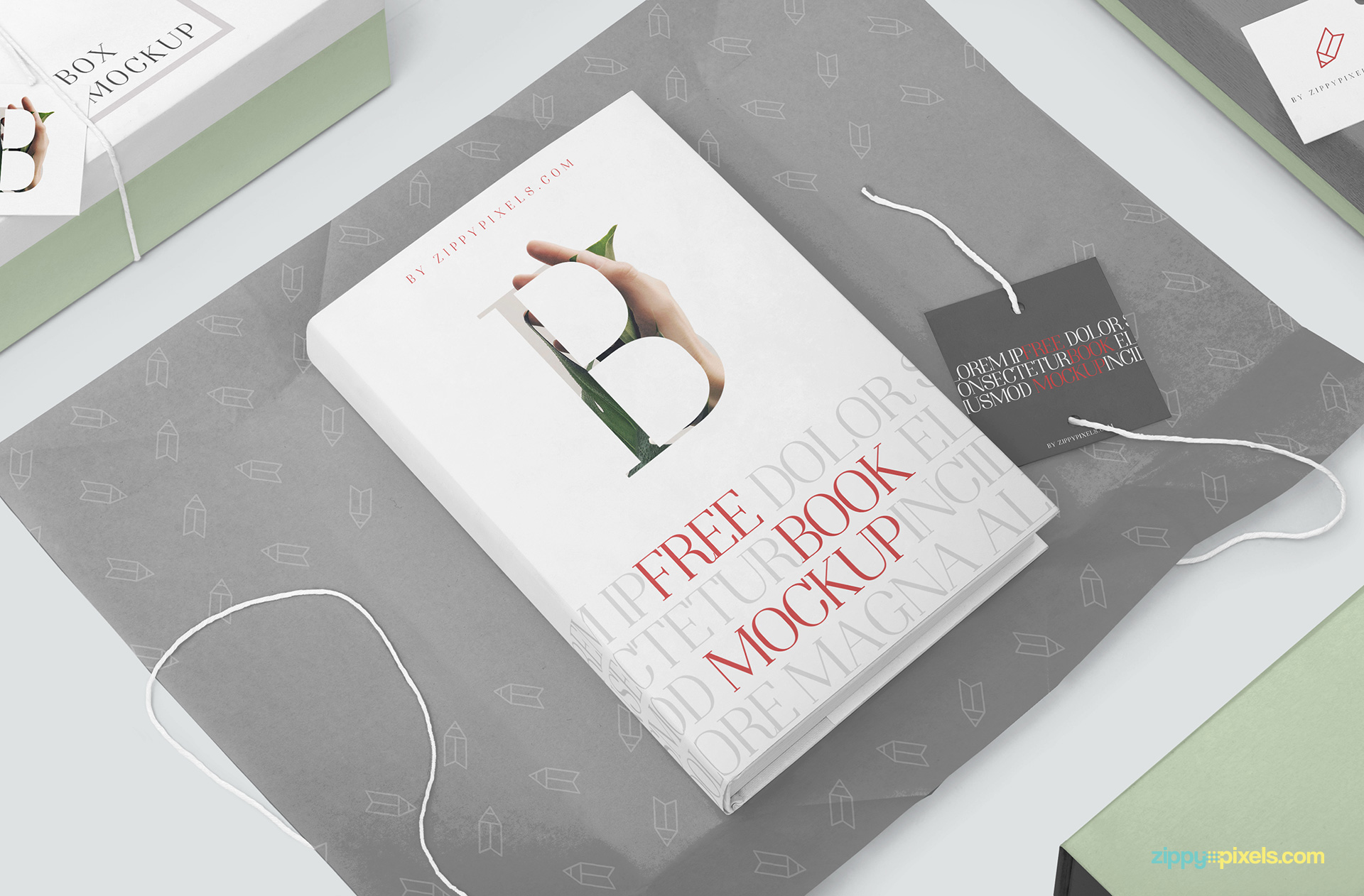 Free book mockup placed on a wrapping paper.