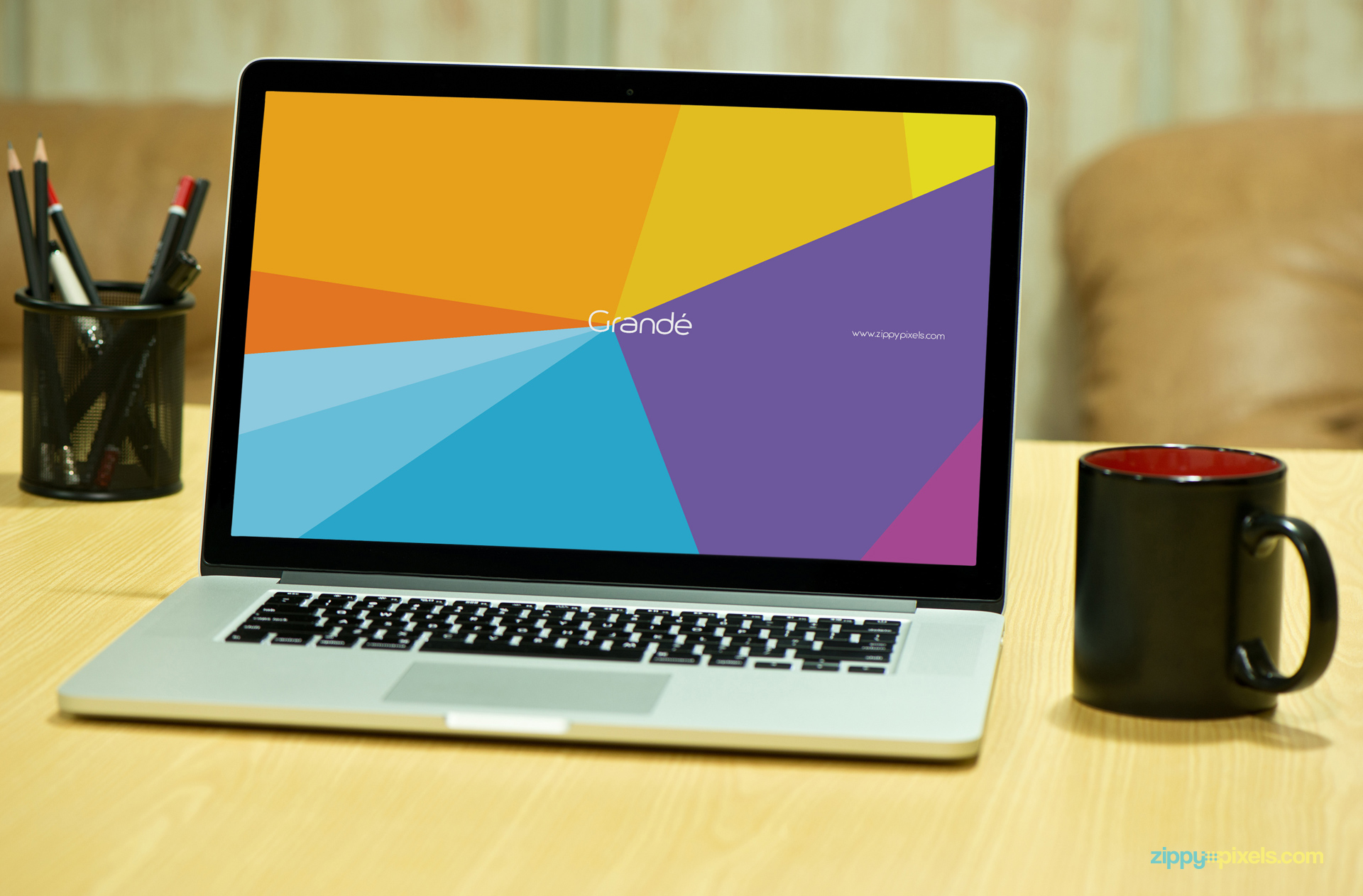 Free Photorealistic Device Mockup of Macbook Pro