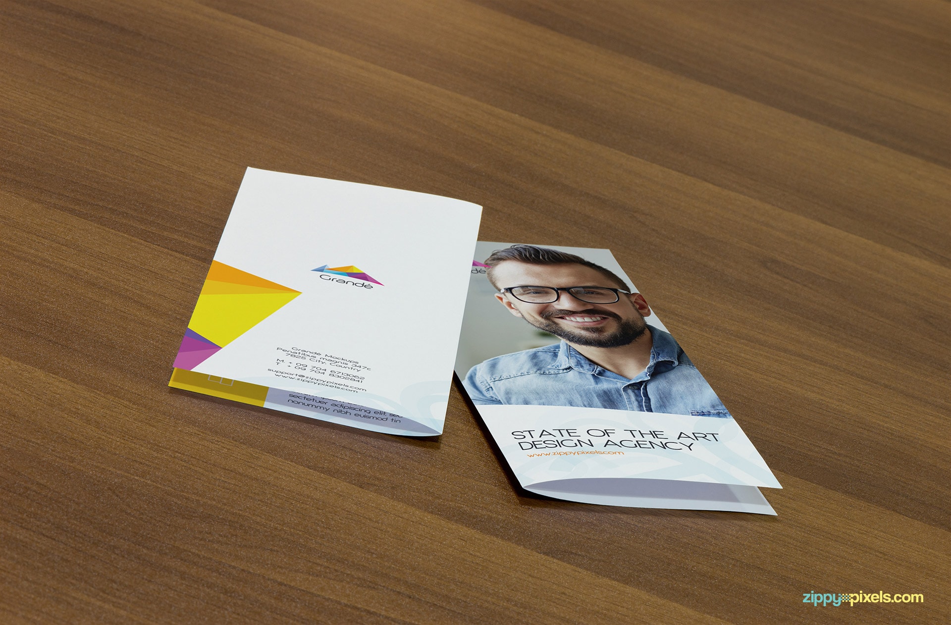 Mockup of 2 Bifold Flyers on Table Showing Front and Back