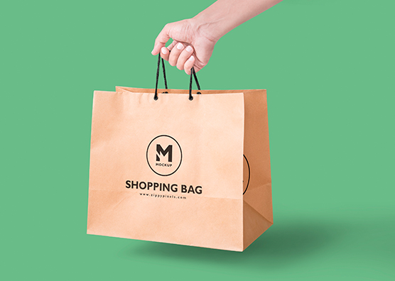 Free Paper Bag Mockup In Handheld View